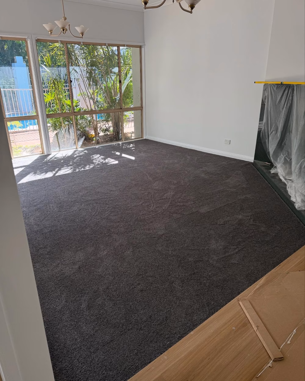 Master bedroom with elegant carpet installation featuring premium underlay for maximum comfort