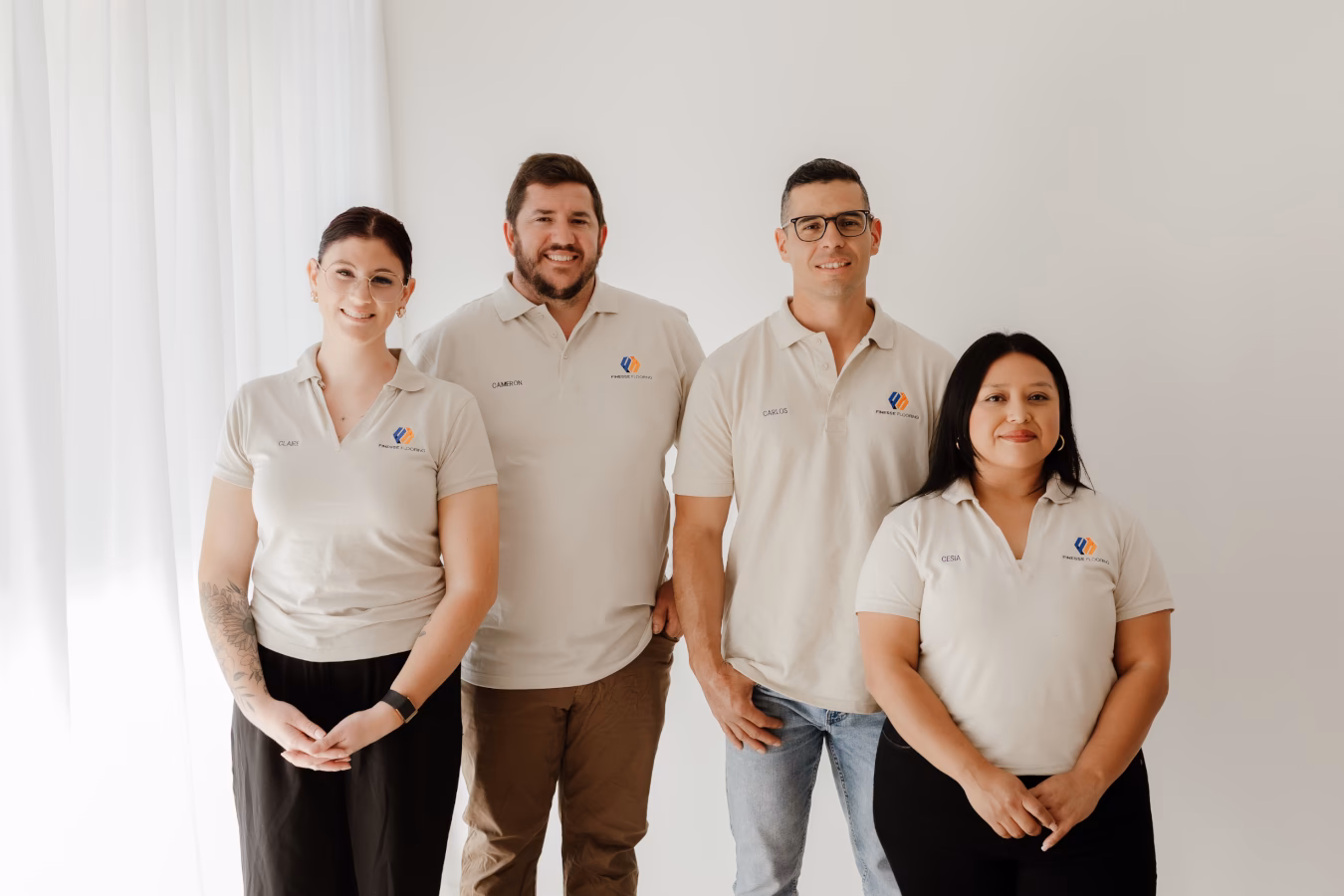 Finesse Flooring Queensland professional team photo showing experienced flooring installers